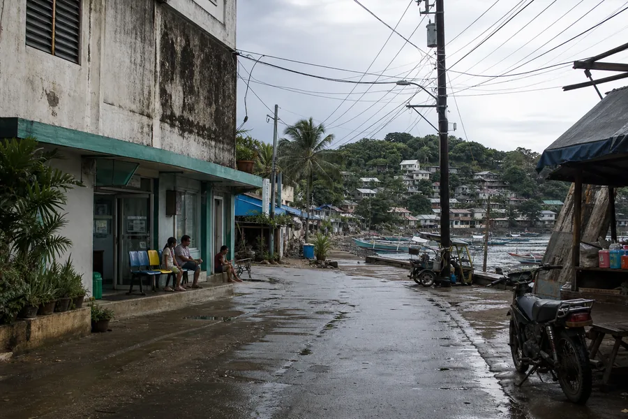 Philippines coastal town street near a small harbor