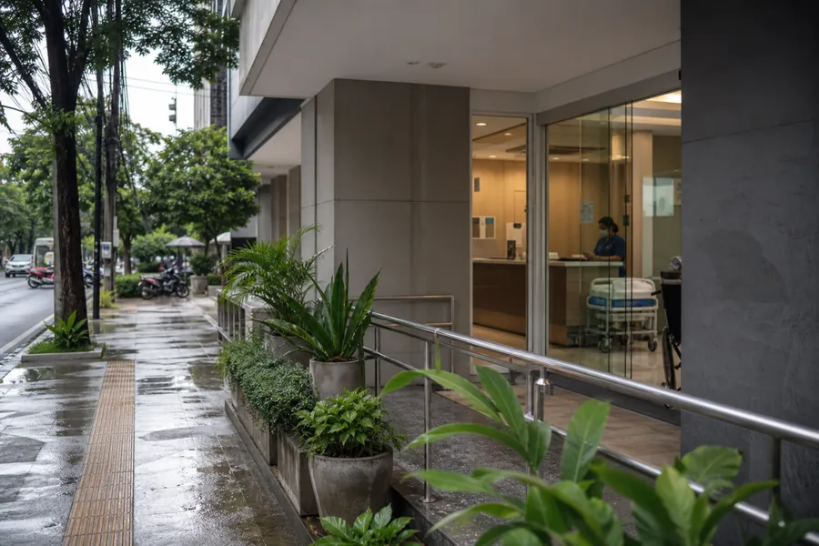 Clinic entrance on a humid Thailand street